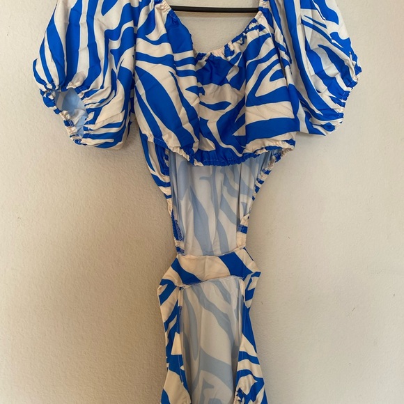 Blue and cream colored all over print off the shoulder, ruffle dress - Picture 4 of 7